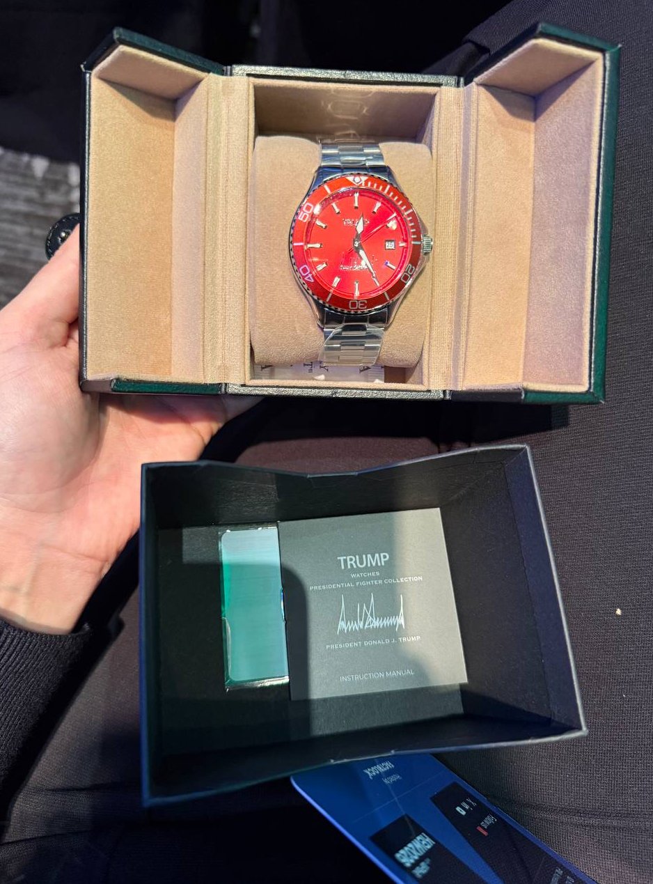 TRUMP Memecoin Co-Founder Promotes Branded Merchandise at KBW 2026